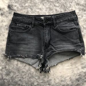 Grey distressed high-waisted shorts